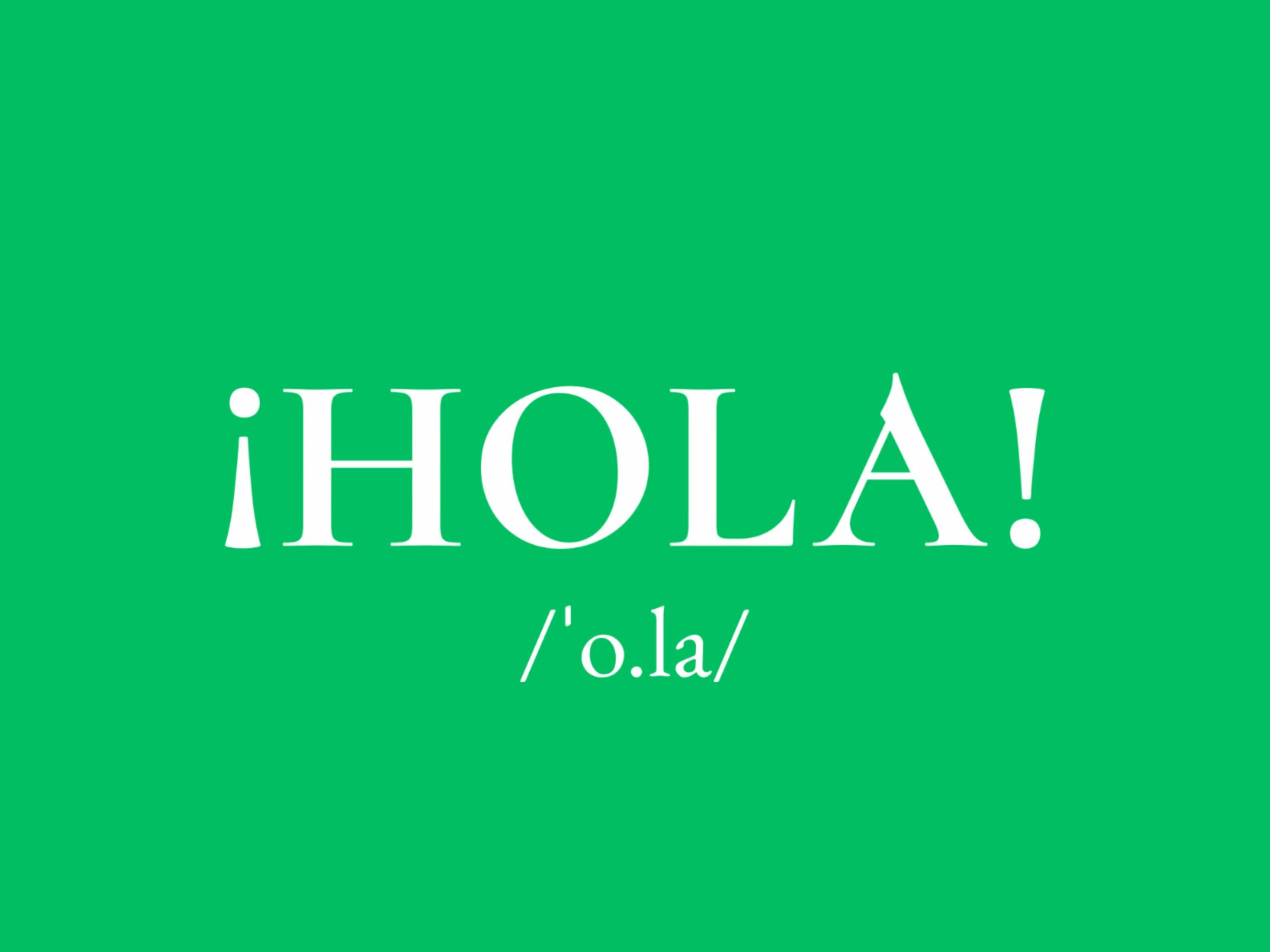 Spanish word hola written in white on a green background, meaning hello